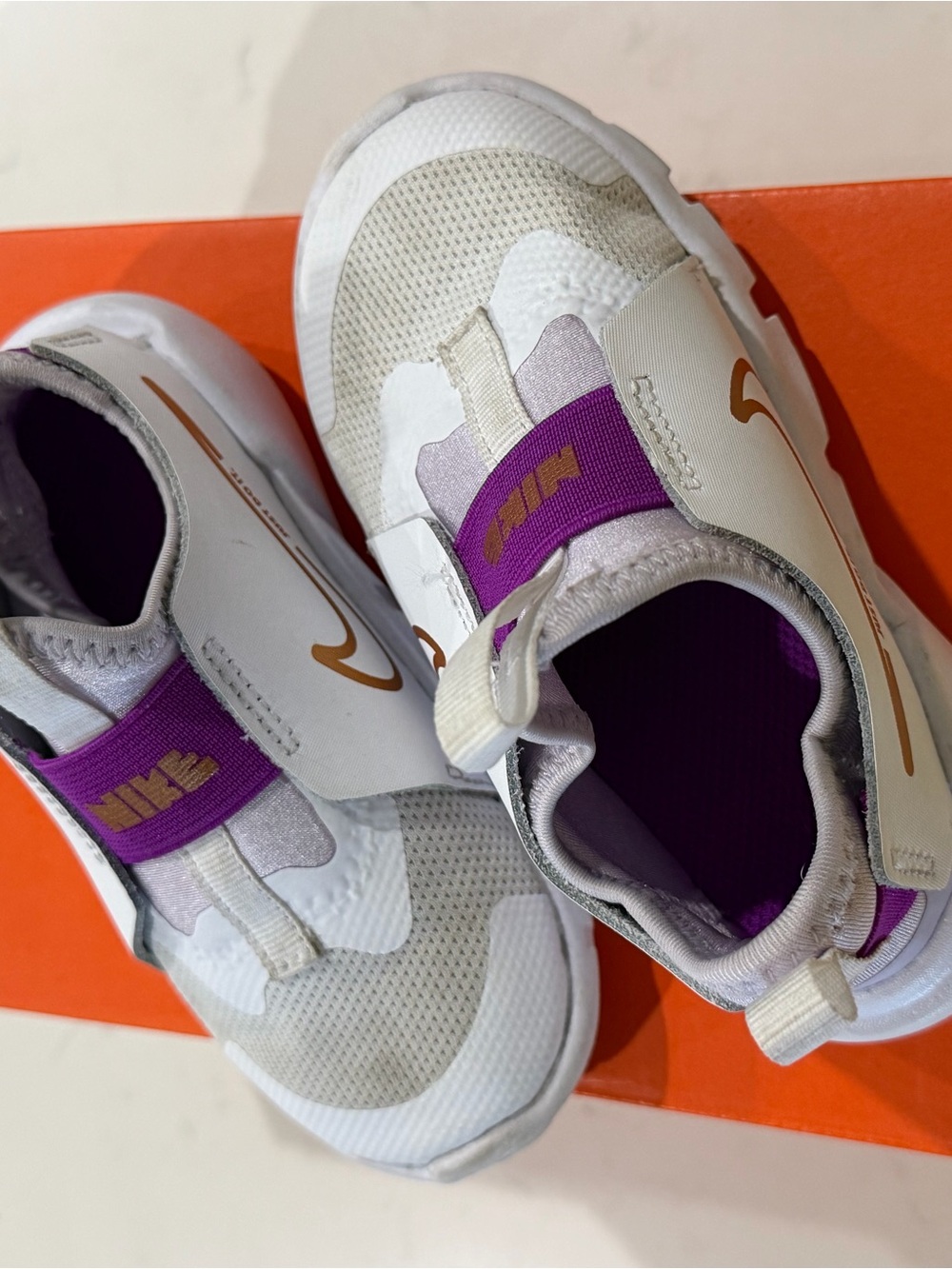 Nike Kids Slip-On Sneakers in White and Purple
